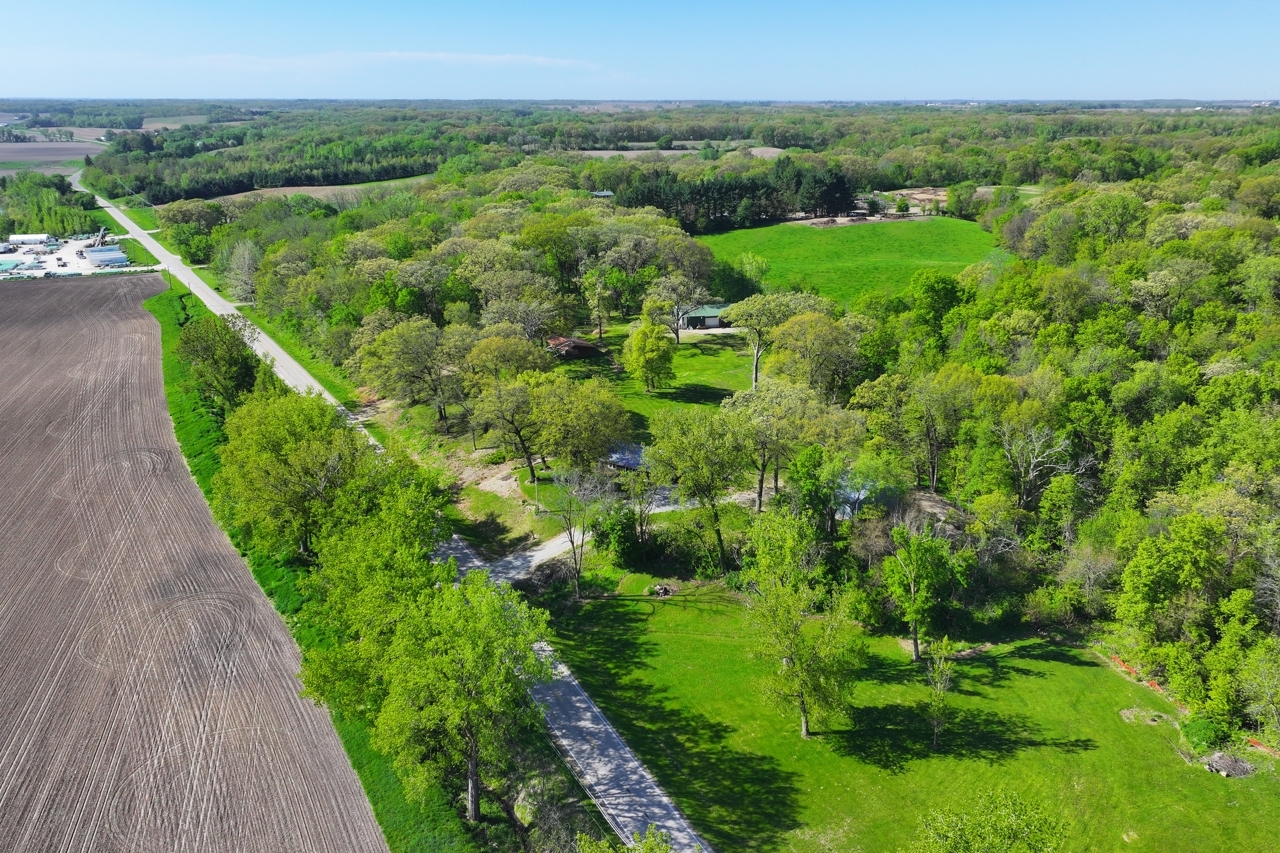 14755 Fenton Road Morrison, IL 61270 - Photo 21 of 34 a view of a lush green forest with lots of trees