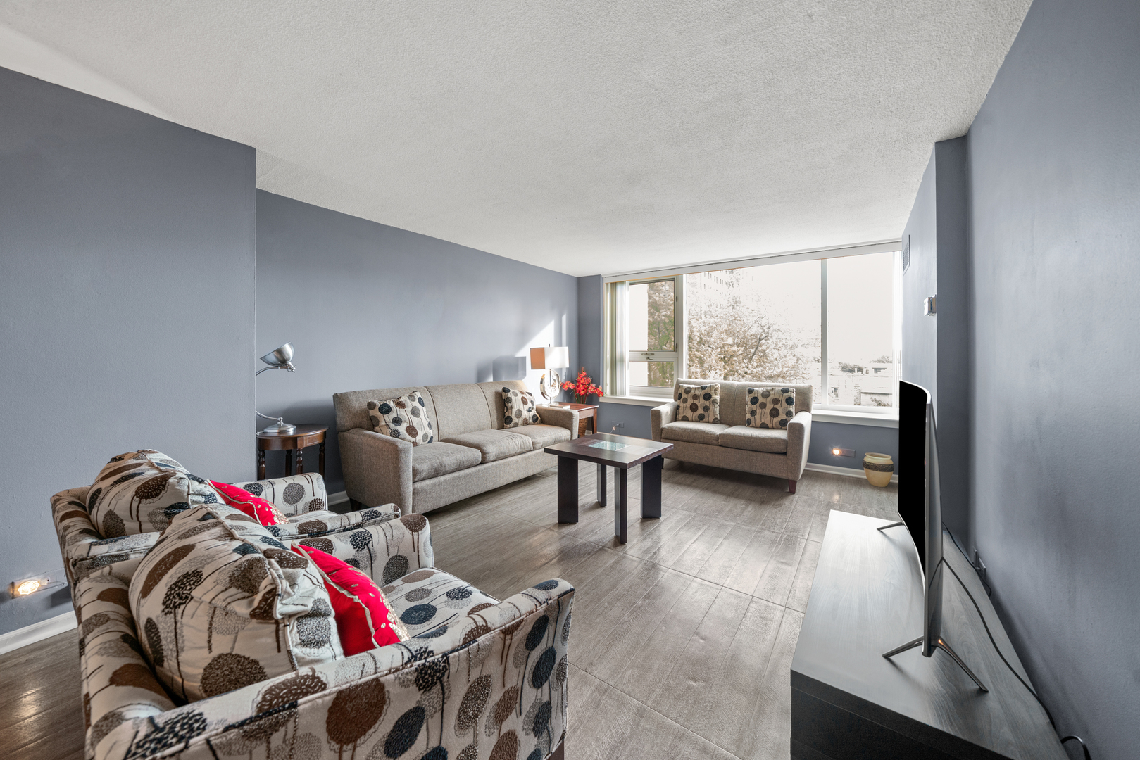 2728 North Hampden Court, Unit 605 Chicago, IL 60614 - Photo 2 of 19 a living room with furniture and a window