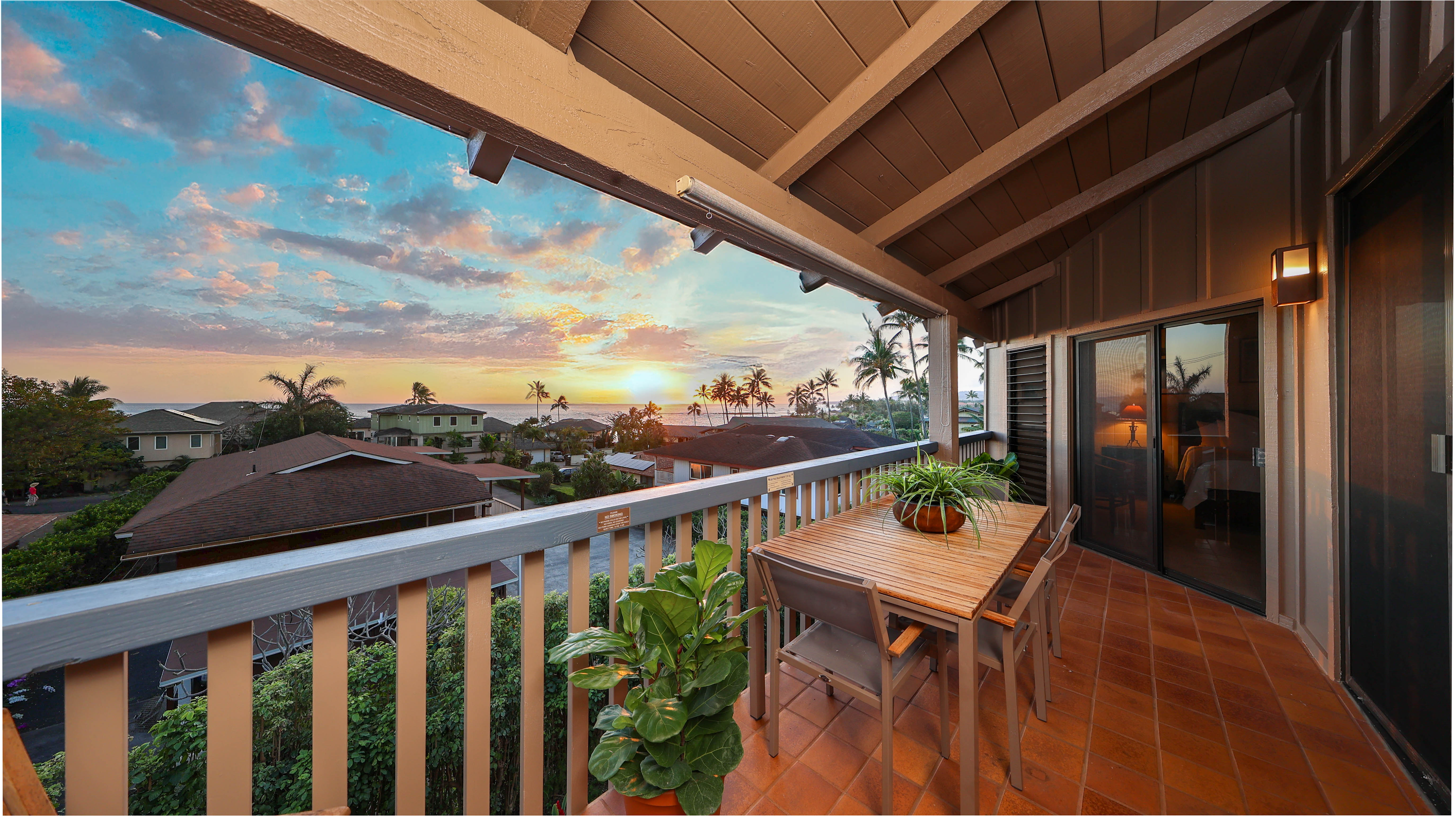 1870 Hoone Road, Unit 522 Koloa, HI 96756 - Photo 1 of 19 a view of a chairs and table in the balcony