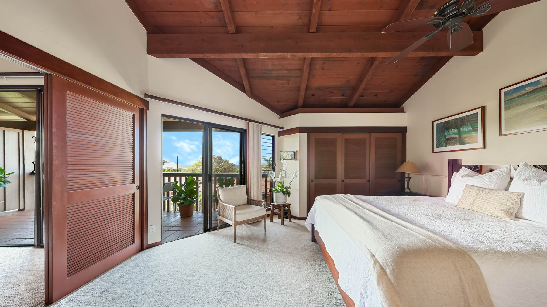 1870 Hoone Road, Unit 522 Koloa, HI 96756 - Photo 8 of 19 a bedroom with a bed and a large window
