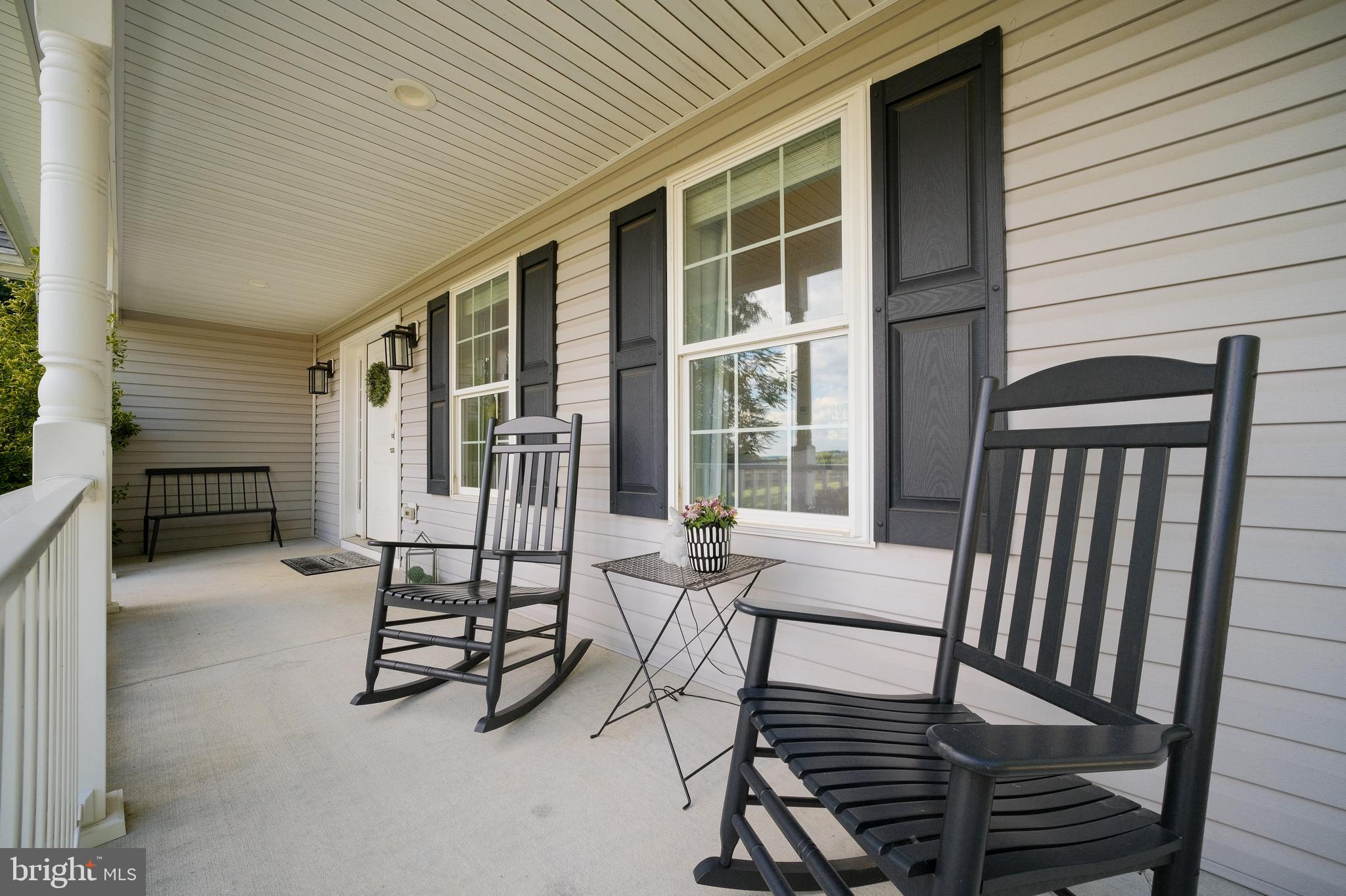 1216 Western Chapel Road New Windsor, MD 21776 - Photo 9 of 84 Relax and unwind on charming, covered front porch