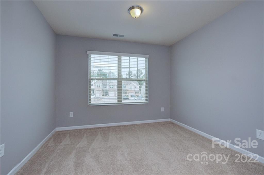 7006 Swamp Chestnut Lane Indian Land, SC 29707 - Photo 19 of 25 an empty room with a window
