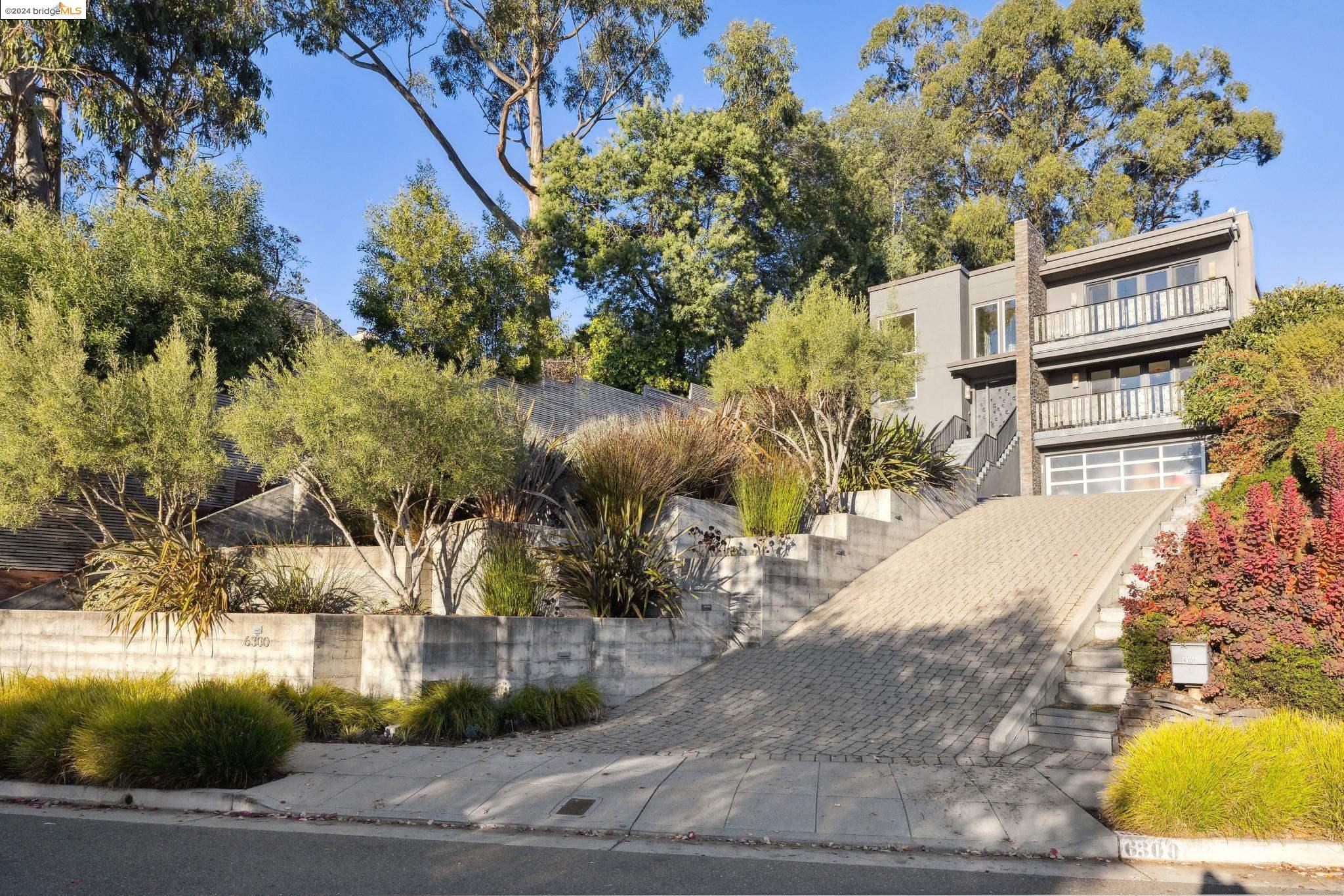 6300 Contra Costa Road Oakland, CA 94618 - Photo 1 of 1 a view of a street with a building in the background