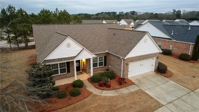 a balcony with table and chairs