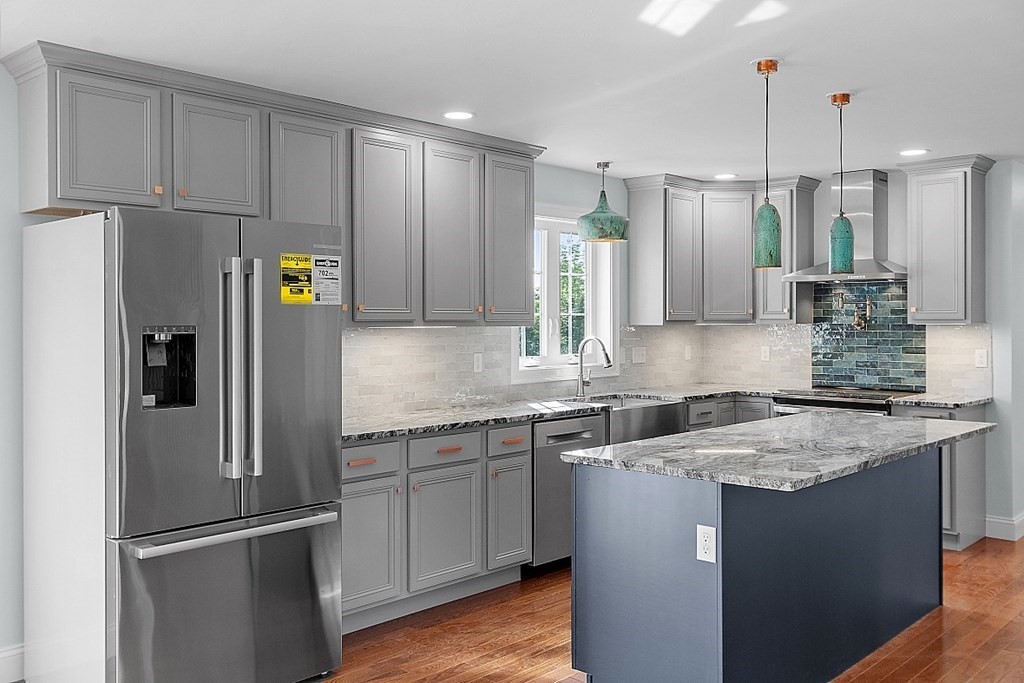 8 Worcester Road, Unit LOT 1 Westminster, MA 01473 - Photo 13 of 38 a kitchen with stainless steel appliances granite countertop a refrigerator a sink and a stove