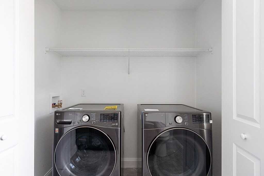8 Worcester Road, Unit LOT 1 Westminster, MA 01473 - Photo 19 of 38 a view of storage and utility room with washer and dryer