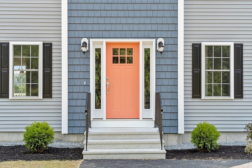 8 Worcester Road, Unit LOT 1 Westminster, MA 01473 - Photo 3 of 38 a front view of a house with a yard