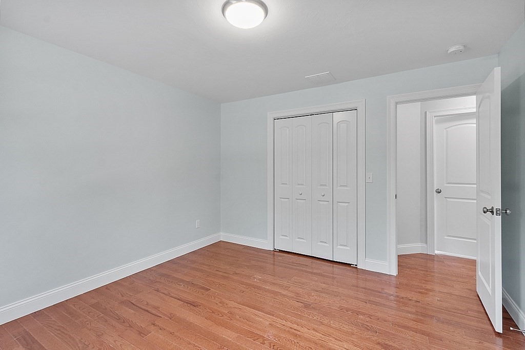 8 Worcester Road, Unit LOT 1 Westminster, MA 01473 - Photo 35 of 38 a view of an empty room with wooden floor