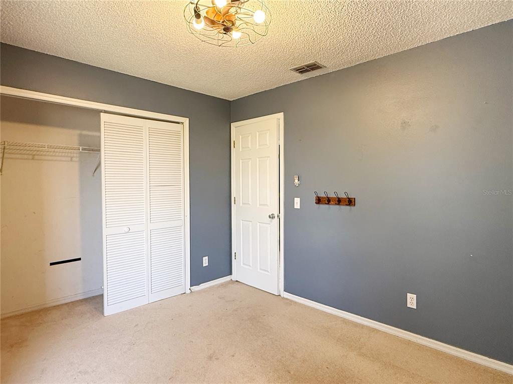 132 Robins Rest Circle Davenport, FL 33896 - Photo 24 of 35 an empty room with a window