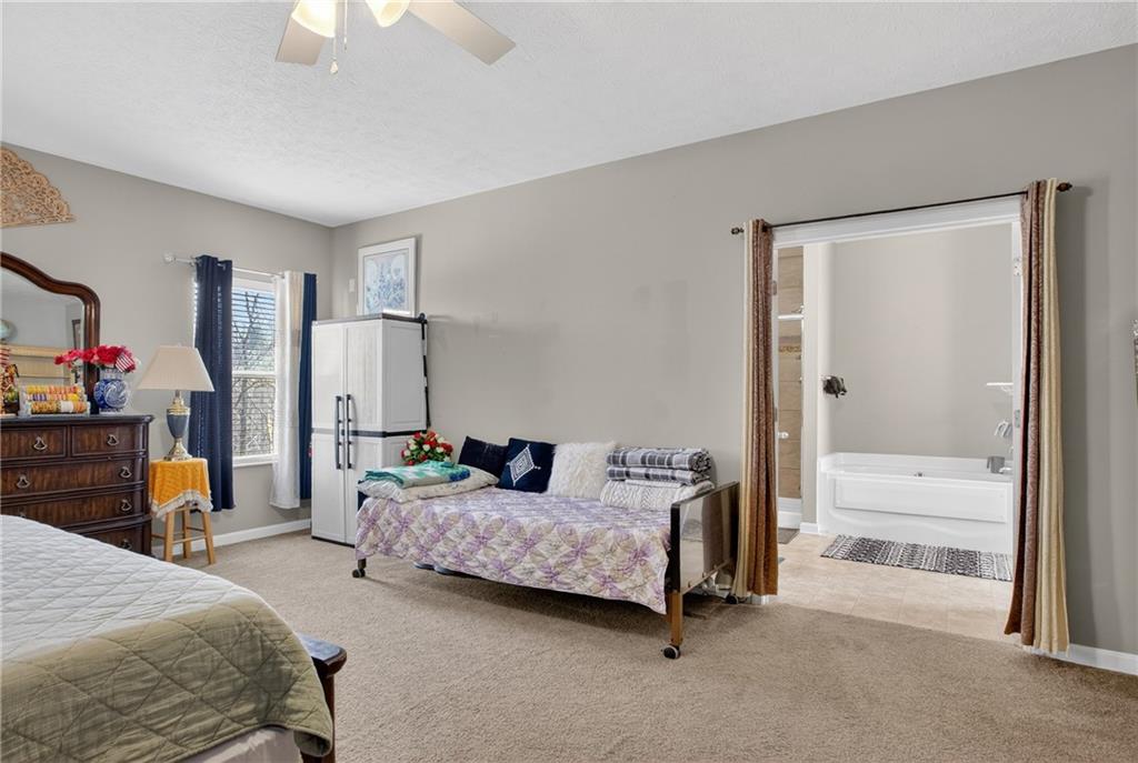 423 Labrador Lane Clairton, PA 15025 - Photo 24 of 49 a bedroom with a bed and a walk in closet