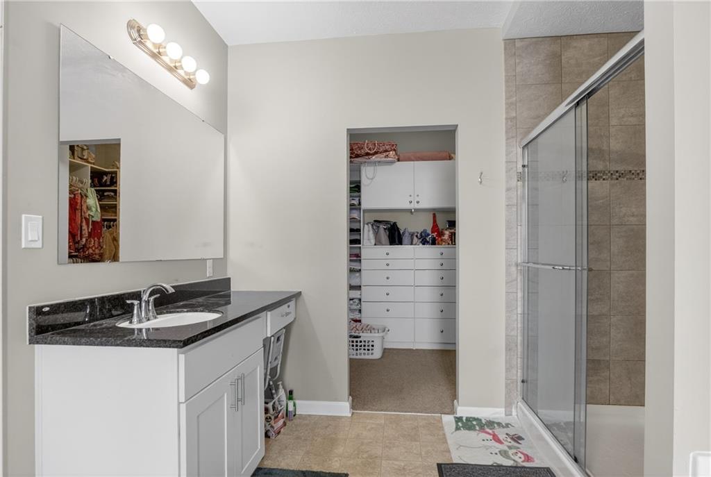 423 Labrador Lane Clairton, PA 15025 - Photo 26 of 49 a bathroom with a sink and a mirror