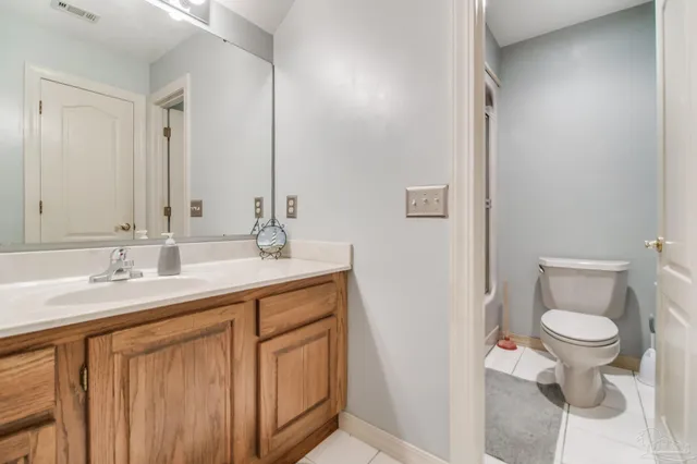 a bed room with furniture and a window