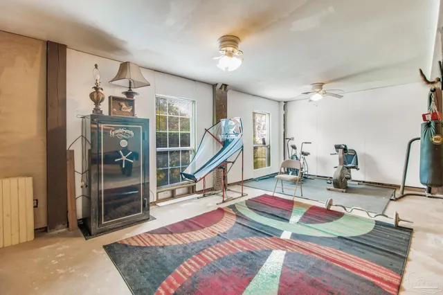 a dining room with furniture and window