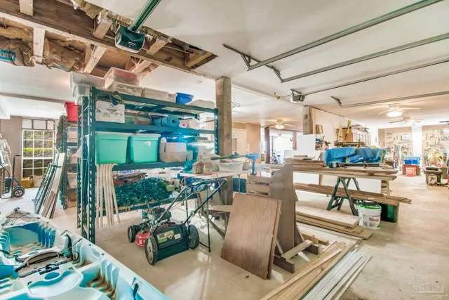 a backyard of a house with yard and outdoor seating