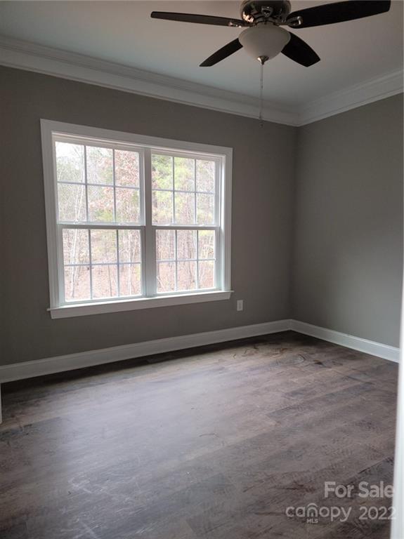 1152 Blacksnake Road Stanley, NC 28164 - Photo 11 of 15 a view of an empty room with a window