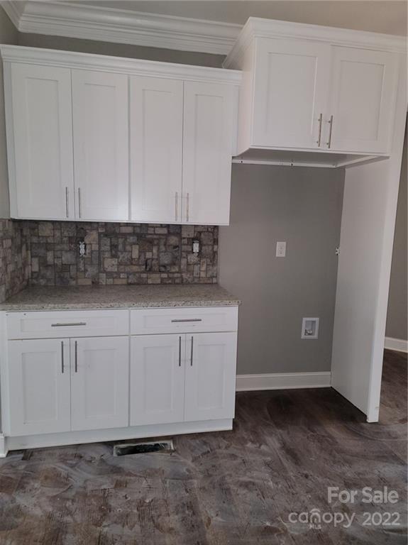 1152 Blacksnake Road Stanley, NC 28164 - Photo 4 of 15 a room with cabinets