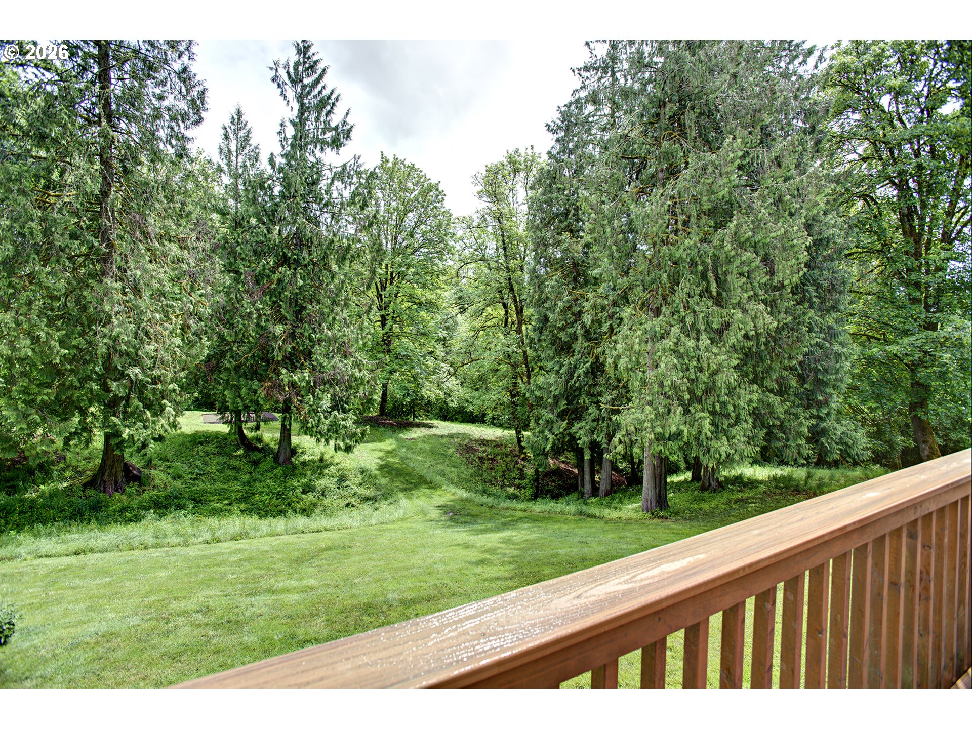 60300 Rays Way St. Helens, OR 97051 - Photo 20 of 41 a view of a backyard with a garden