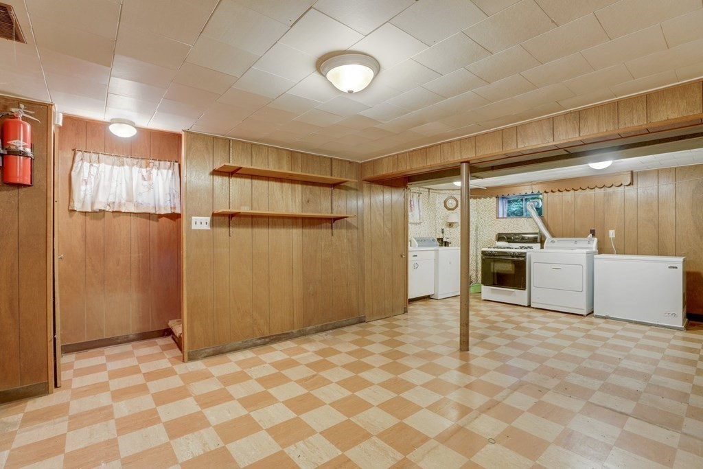 48 Maynard Street Boston, MA 02131 - Photo 16 of 23 a view of a refrigerator in kitchen and an empty room