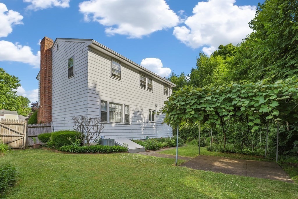 48 Maynard Street Boston, MA 02131 - Photo 18 of 23 a view of a house with a backyard