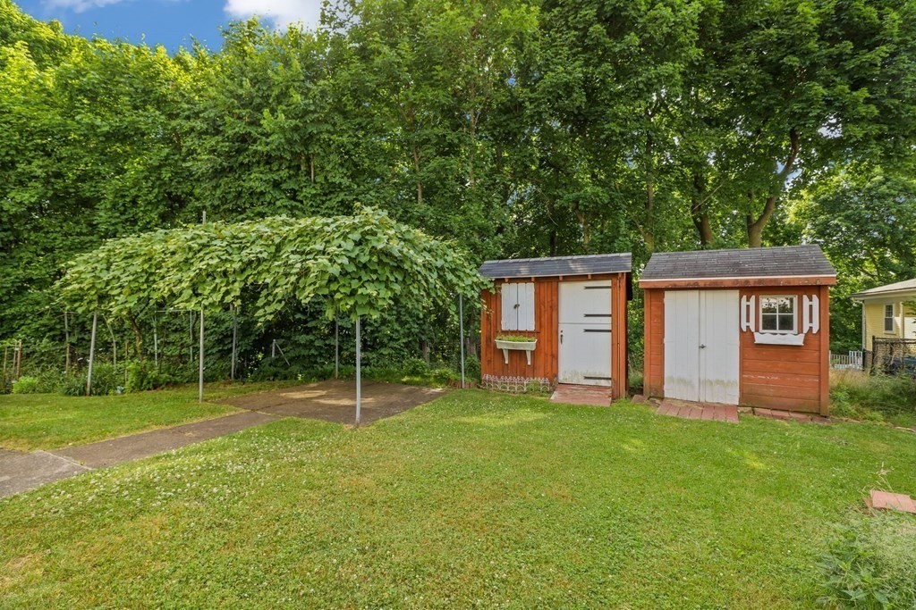 48 Maynard Street Boston, MA 02131 - Photo 20 of 23 a view of a house with a backyard