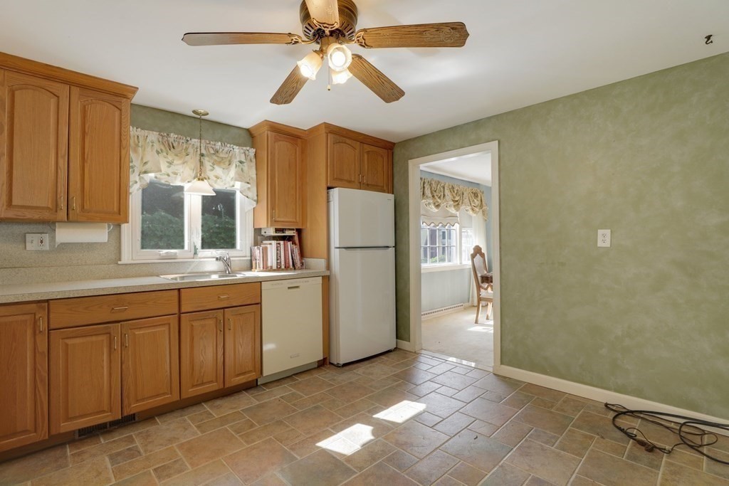 48 Maynard Street Boston, MA 02131 - Photo 2 of 23 a kitchen with refrigerator and window