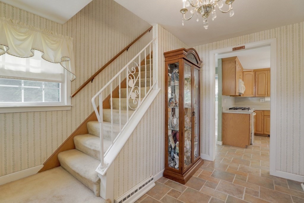 48 Maynard Street Boston, MA 02131 - Photo 8 of 23 a view of entryway and hall with a window