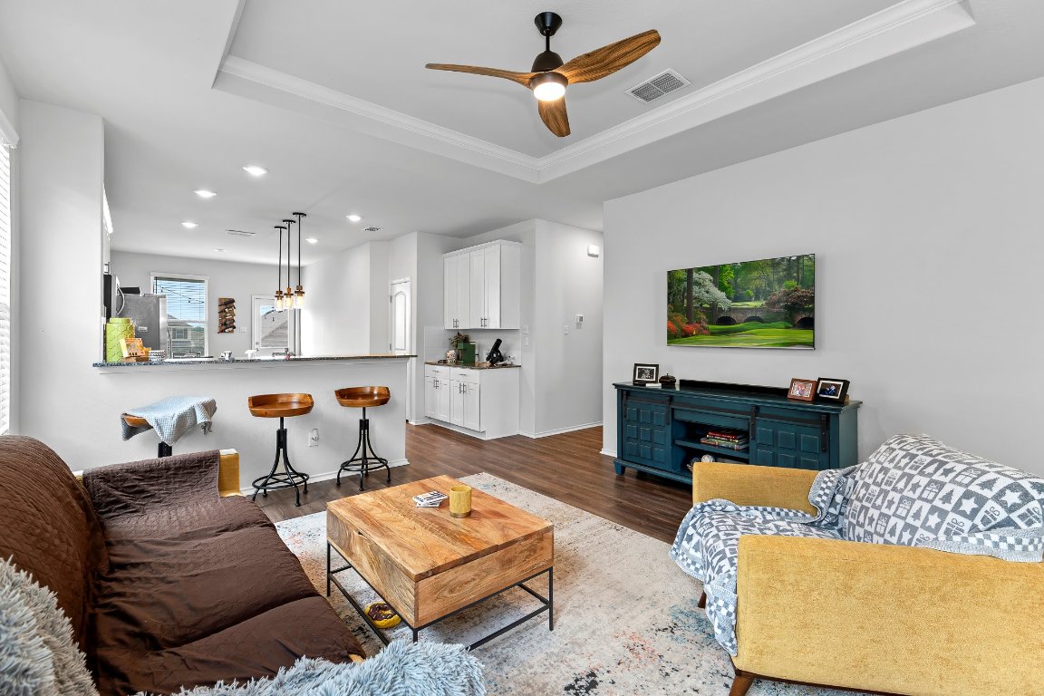 469 Grace Lilly Drive Buda, TX 78610 - Photo 1 of 1 a living room with furniture kitchen view and a table
