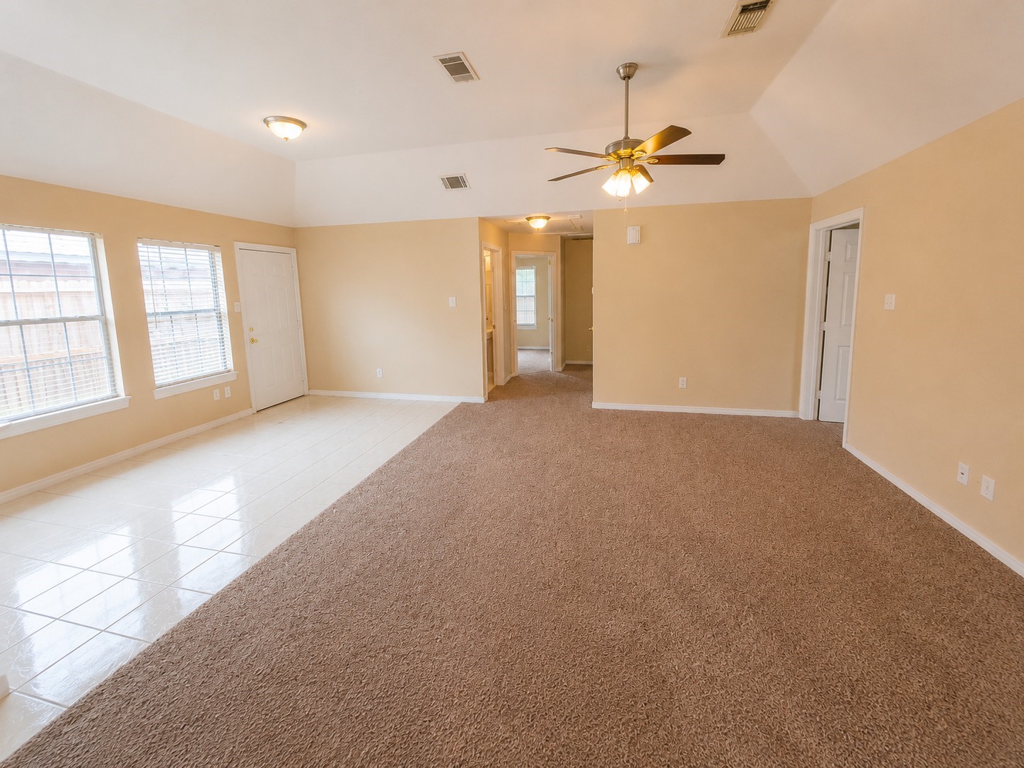 12926 Abalone Way Houston, TX 77044 - Photo 4 of 15 a view of an empty room with a window