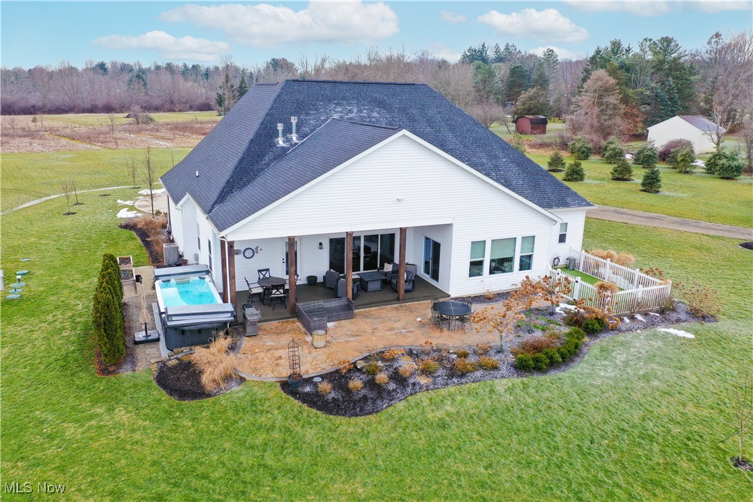 4437 Beach Road Medina, OH 44256 - Photo 43 of 50 Rear view of house featuring a yard, outdoor lounge area, and a patio area
