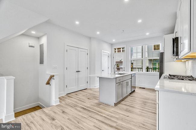11236 Bunsen Street Reston, VA 20190 - Photo 15 of 61 Bright and airy modern kitchen space.