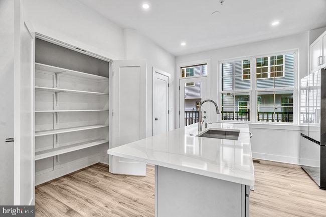 11236 Bunsen Street Reston, VA 20190 - Photo 16 of 61 Bright and airy modern kitchen space.