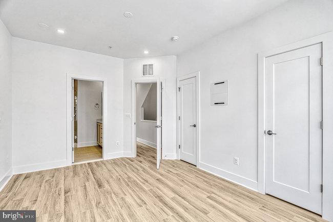 11236 Bunsen Street Reston, VA 20190 - Photo 27 of 61 Bright and airy modern space awaits.