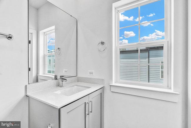 11236 Bunsen Street Reston, VA 20190 - Photo 42 of 61 Bright and airy bathroom oasis.
