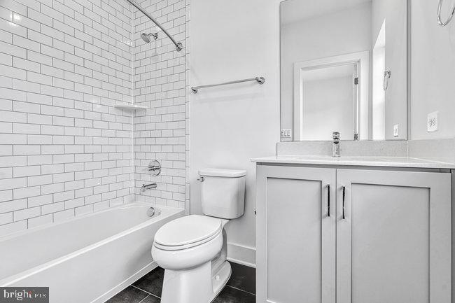 11236 Bunsen Street Reston, VA 20190 - Photo 43 of 61 Sleek modern bathroom with clean lines.