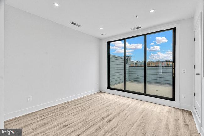 11236 Bunsen Street Reston, VA 20190 - Photo 46 of 61 Bright, airy space with skyline views.