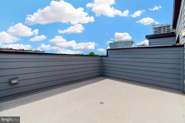 11236 Bunsen Street Reston, VA 20190 - Photo 48 of 61 Spacious rooftop retreat with skyline views.