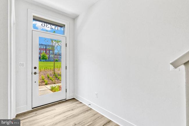 11236 Bunsen Street Reston, VA 20190 - Photo 5 of 61 Bright entryway with garden view.