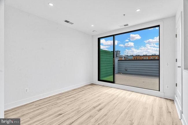 11236 Bunsen Street Reston, VA 20190 - Photo 51 of 61 Bright, airy space with skyline views.