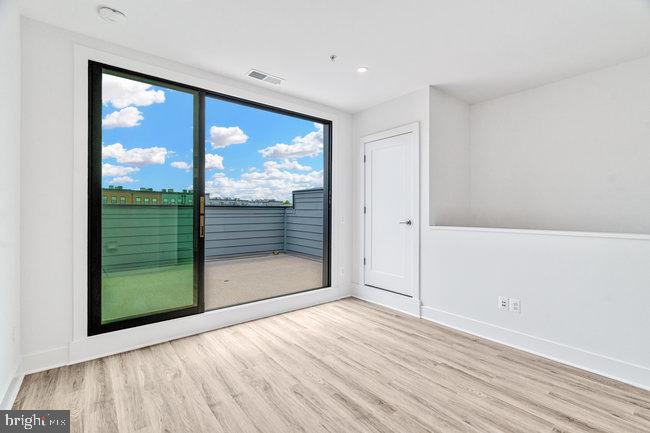 11236 Bunsen Street Reston, VA 20190 - Photo 52 of 61 Bright space with scenic balcony view.