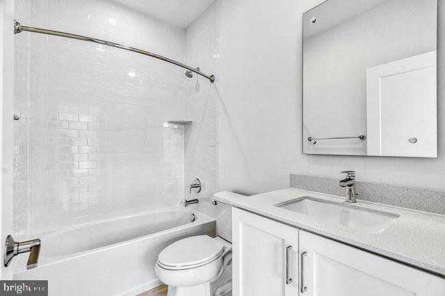 11236 Bunsen Street Reston, VA 20190 - Photo 8 of 61 Sleek and modern bathroom retreat.