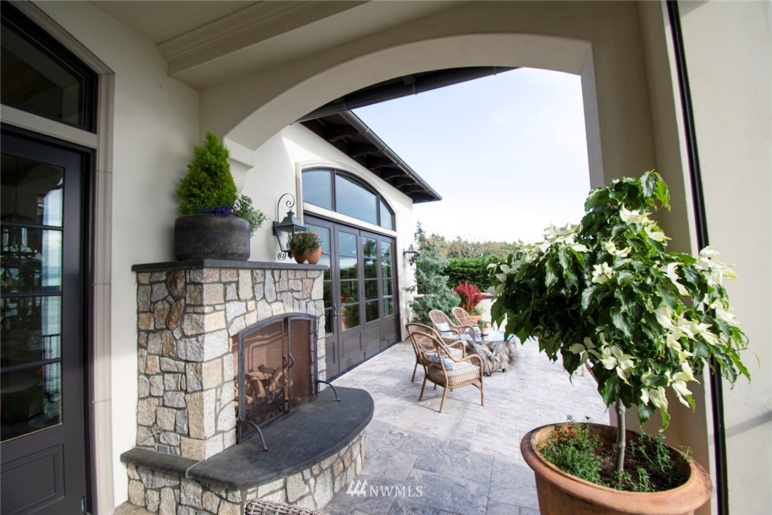 8635 Fauntleroy Way Southwest Seattle, WA 98136 - Photo 13 of 36 a building outdoor space with patio furniture and potted plants