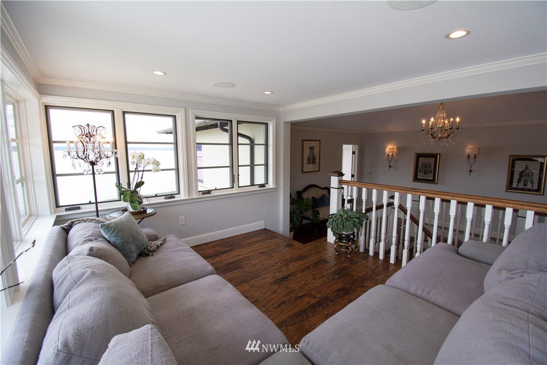 8635 Fauntleroy Way Southwest Seattle, WA 98136 - Photo 18 of 36 a living room with furniture and a large window