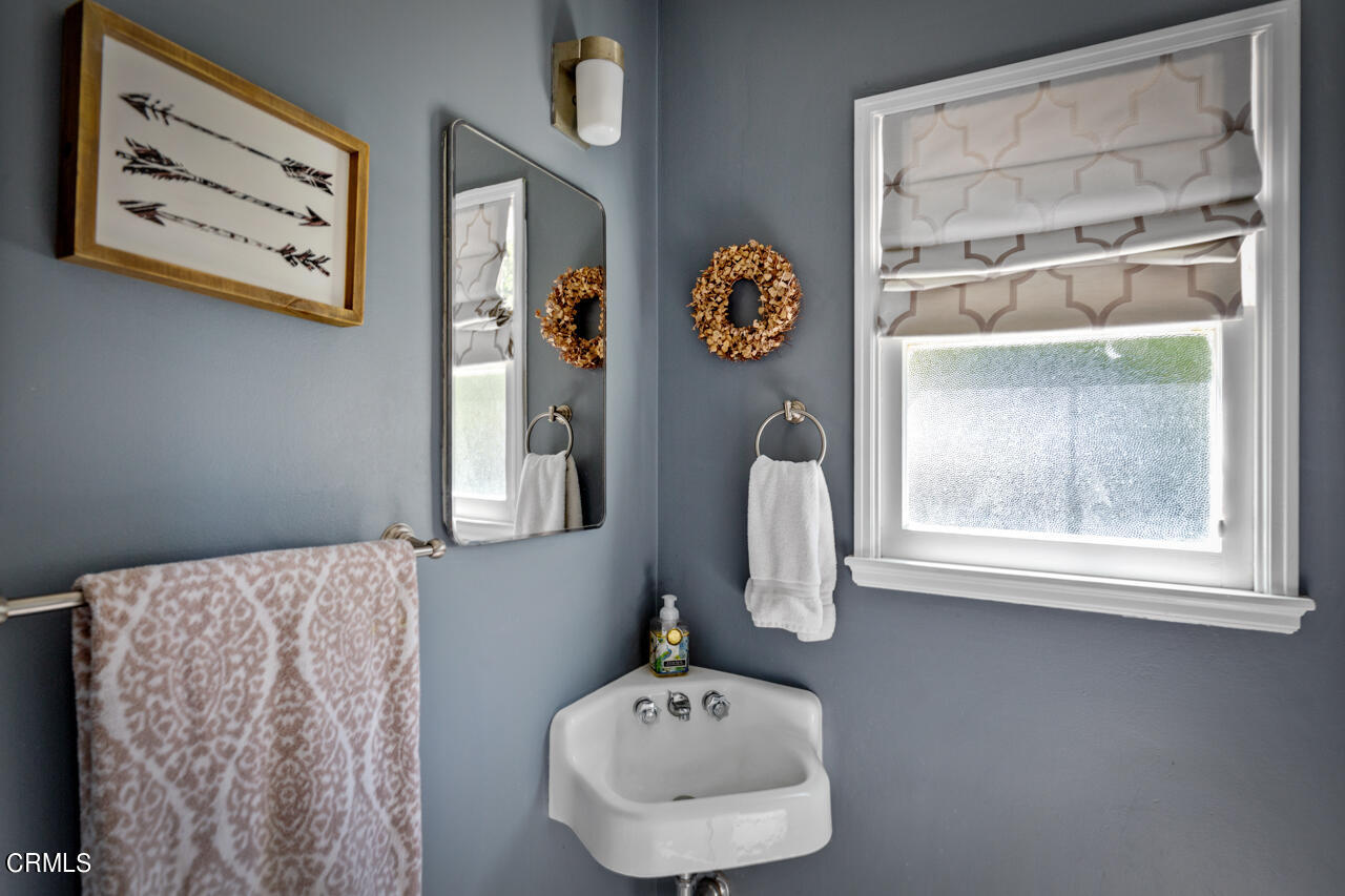 2355 Brigden Road Pasadena, CA 91104 - Photo 13 of 30 a bathroom with a sink and a mirror