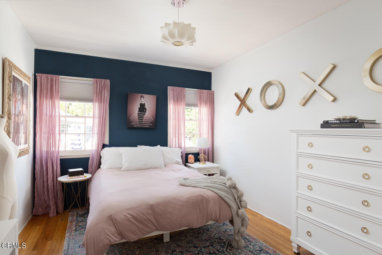 2355 Brigden Road Pasadena, CA 91104 - Photo 19 of 30 a bedroom with a bed and a dresser