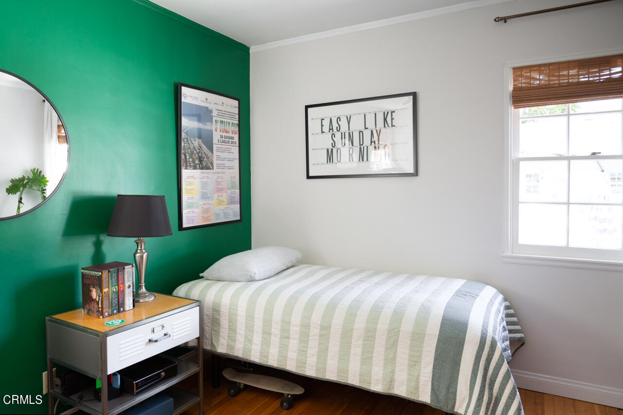 2355 Brigden Road Pasadena, CA 91104 - Photo 20 of 30 a bedroom with a bed lamps and a window