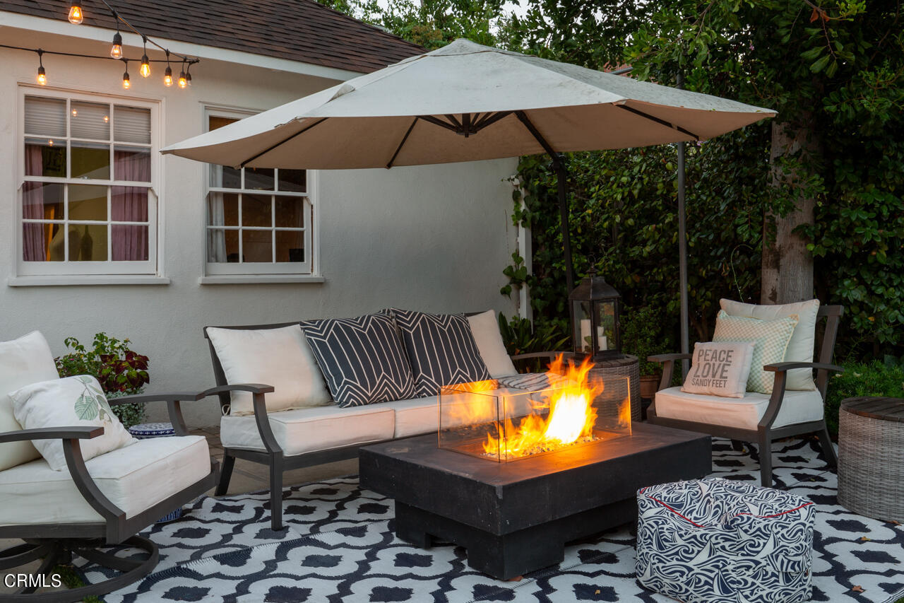 2355 Brigden Road Pasadena, CA 91104 - Photo 23 of 30 a outdoor space with patio lots of furniture and umbrella