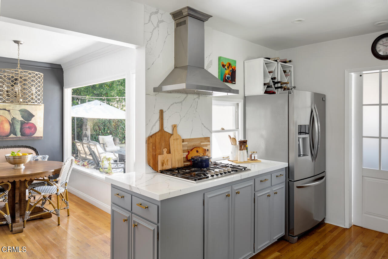 2355 Brigden Road Pasadena, CA 91104 - Photo 9 of 30 a kitchen with stainless steel appliances granite countertop a refrigerator and a stove top oven