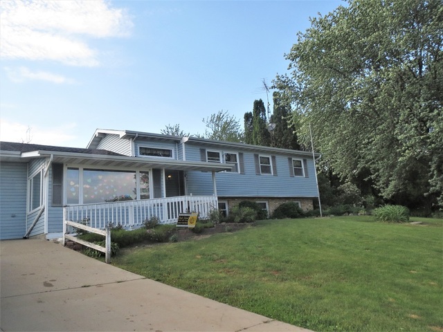 9536 West Woosung Road Dixon, IL 61021 - Photo 2 of 24 a view of backyard of house with green space