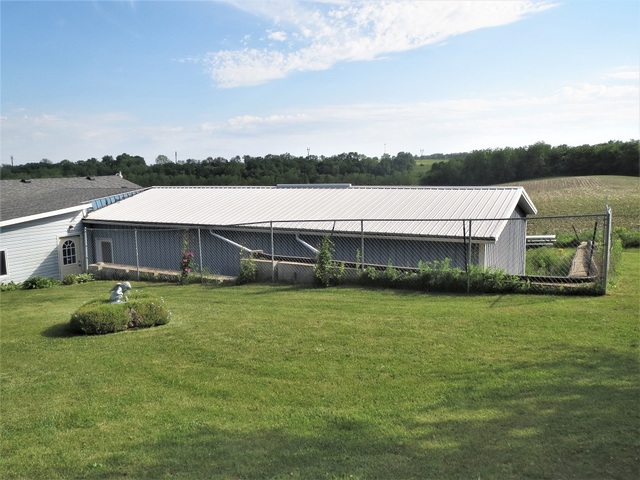 9536 West Woosung Road Dixon, IL 61021 - Photo 22 of 24 a house view with a garden space