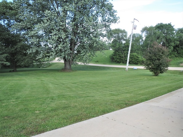 9536 West Woosung Road Dixon, IL 61021 - Photo 24 of 24 a view of a golf course with a yard
